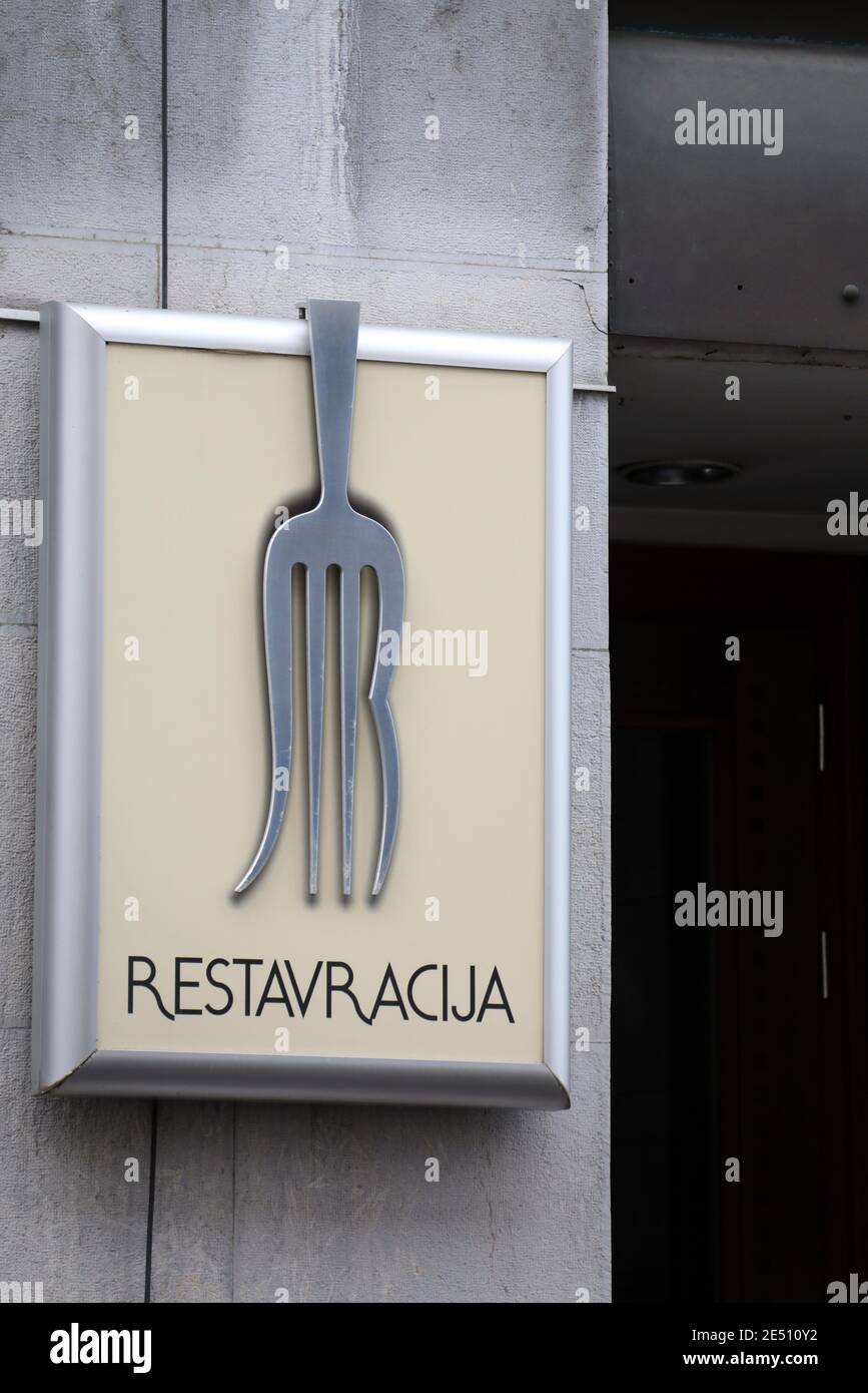 Restaurant sign in Ljubljana Stock Photo