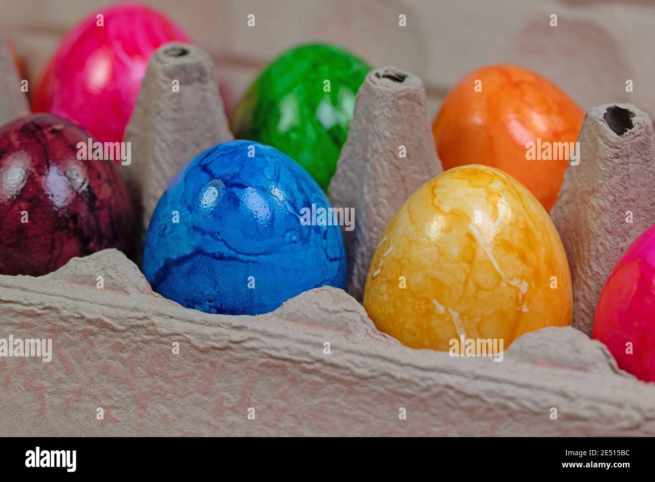 Colored chicken eggs in the package Stock Photo