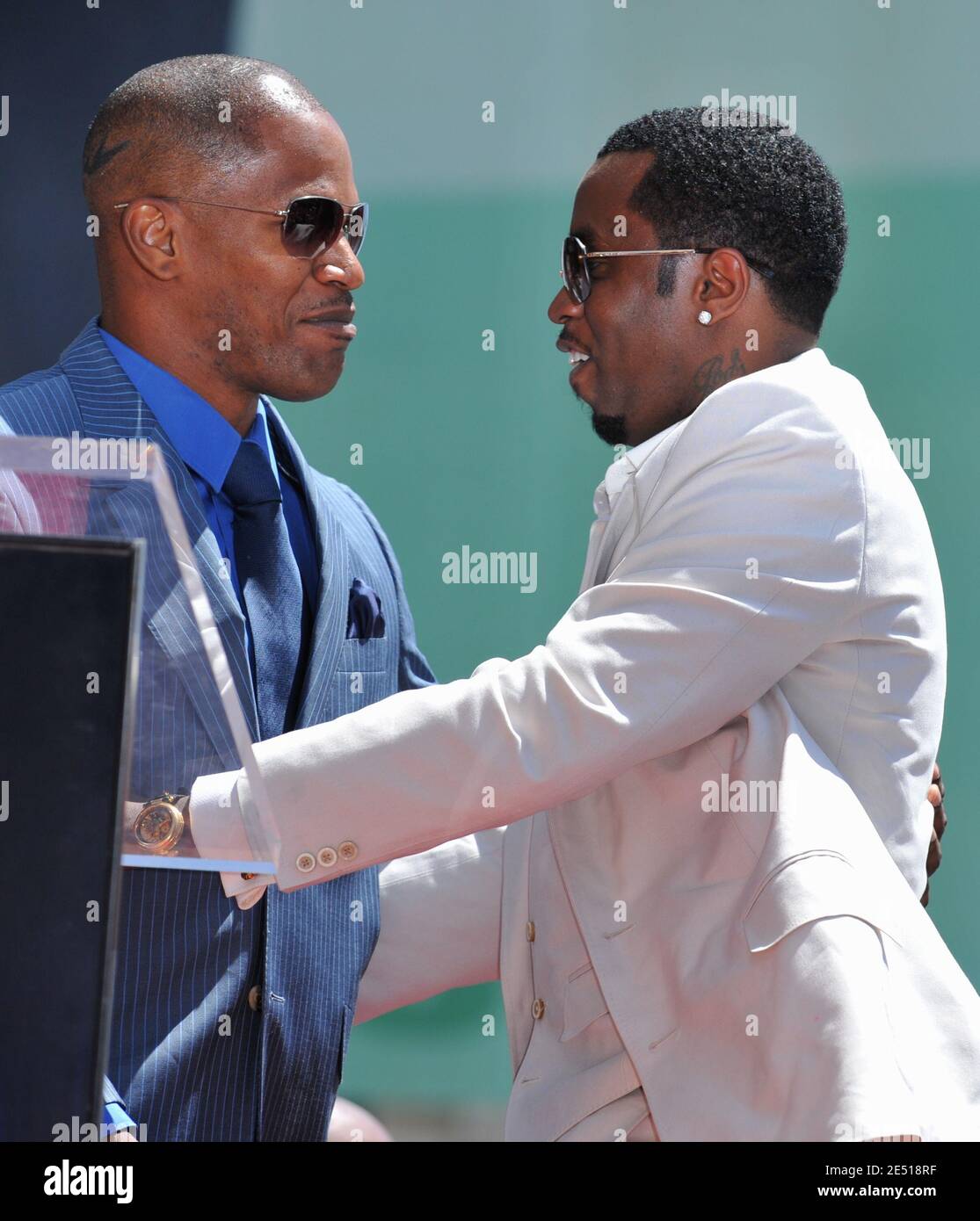Musician singer and entrepreneur Sean Diddy Combs (R) listens as actor Jamie Foxx speaks before Combs was honored with a star on Hollywood walk of fame, on Hollywood Boulevard in Hollywood, CA, USA on May 2, 2008. Photo by Lionel Hahn/ABACAPRESS.COM Stock Photo
