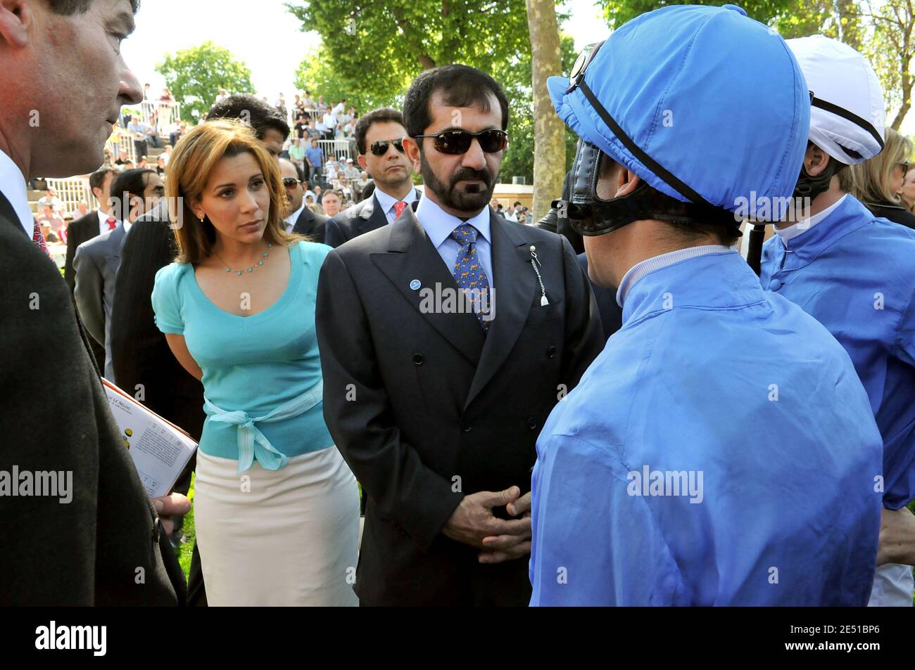 Jordan's Princess Haya and her husband, Dubai's ruler, Sheikh Mohammed Bin Rashed Al Maktoum talk with Italian jockey Lanfranco 'Frankie' Dettori as they attend colts race, known as 'Poule d'Essai des Poulains' at Longchamp racecourse in Paris, France, on May 11, 2008. Photo by Ammar Abd Rabbo/ABACAPRESS.COM Stock Photo