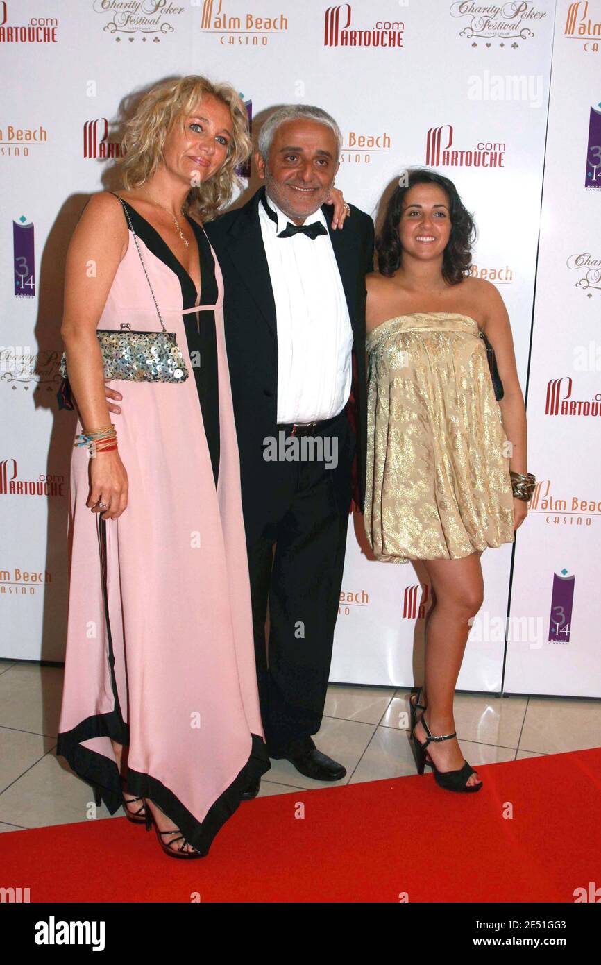 Patrick Partouche, his wife and his daughter Salome attend the 'Charity Poker Festival' at the 'Palm Beach' Casino during the 61st International Film Festival in Cannes, France on May 17, 2008. Photo by Benoit Pinguet/ABACAPRESS.COM Stock Photo