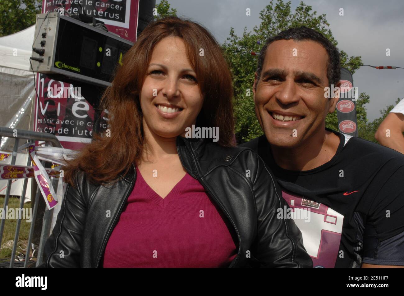 Former freestyle skiing olympic bronze medalist Sandra Laoura and former  basket player Richard Dacoury during the 'les boucles d'or' marathon for  the association '1000 femmes, 1000 vies' which wrestled for the cancer