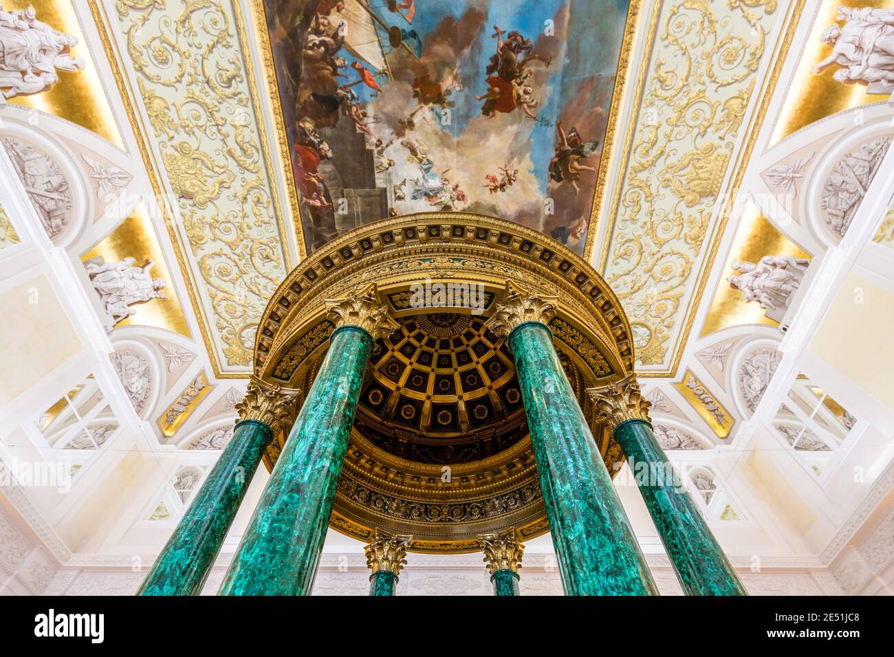 Wide angle view of a golden kiosk held by six green malachite columns in Hermitage Winter Palace Stock Photo