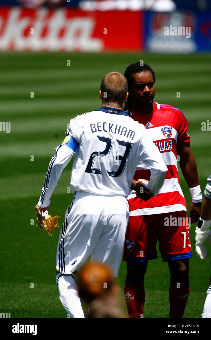 LA Galaxy Midfielder David Beckham (#23) gave his jersey shirt to a fan,  and walks off the field. The Houston Dynamo and the LA Galaxy tie the game  0-0 at Robertson Stadium. (