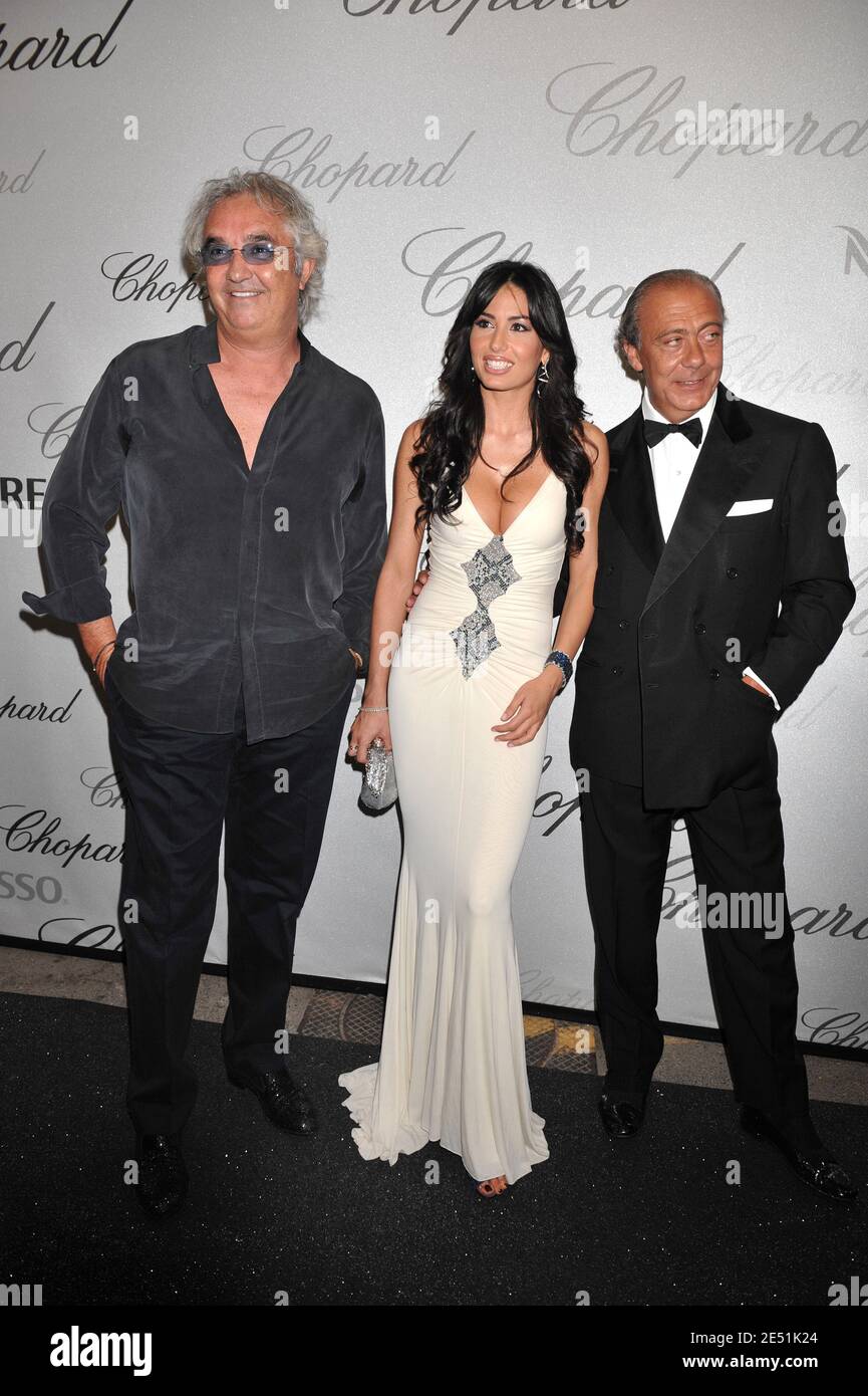 Flavio Briatore with his girlfriend and Fawaz Gruosi arriving at the Chopard Party at Carlton Beach during the 61st International Cannes Film Festival on May 19, 2008 in Cannes, France. Photo by Hahn-Nebinger-Orban/ABACAPRESS.COM Stock Photo
