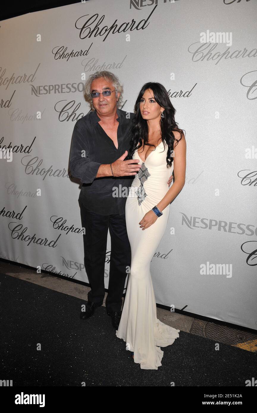 Flavio Briatore with his girlfriend arriving at the Chopard Party at Carlton Beach during the 61st International Cannes Film Festival on May 19, 2008 in Cannes, France. Photo by Hahn-Nebinger-Orban/ABACAPRESS.COM Stock Photo