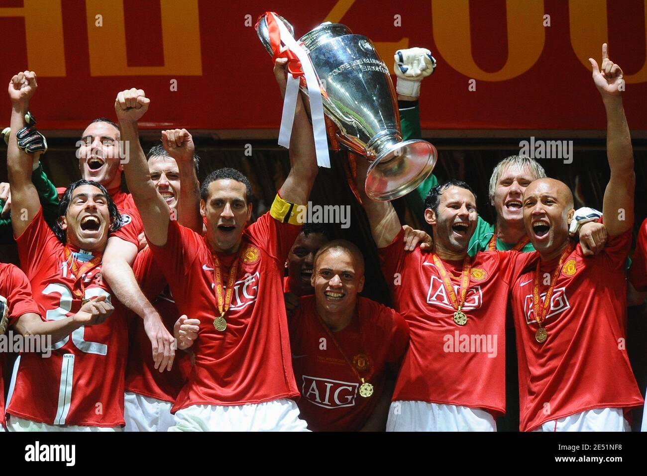 Manchester United's Rio Ferdinand and Ryan Giggs hold the cup and celebrate  their victory with teammates during the UEFA Champions League Final Soccer  match, Manchester United vs Chelsea at the Luzhniki Stadium