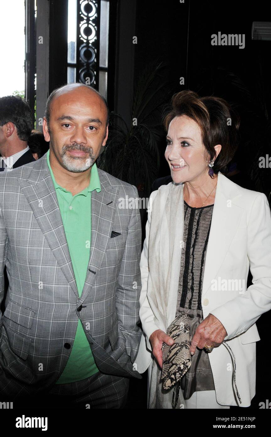 Designer Christian Louboutin and Yaguel Didier attend a party celebrating the launch of a new women's monthly 'Femmes' in Paris, France, on May 21, 2008. Photo by Ammar Abd Rabbo/ABACAPRESS.COM Stock Photo