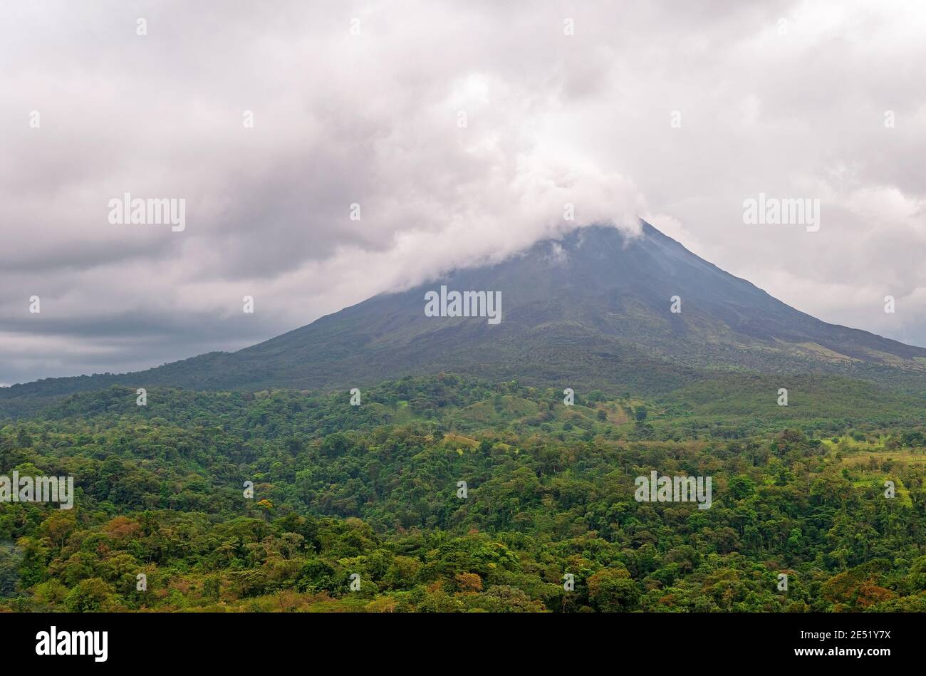 Arenal volcano with tropical rainforest, La Fortuna, Costa Rica. Stock Photo