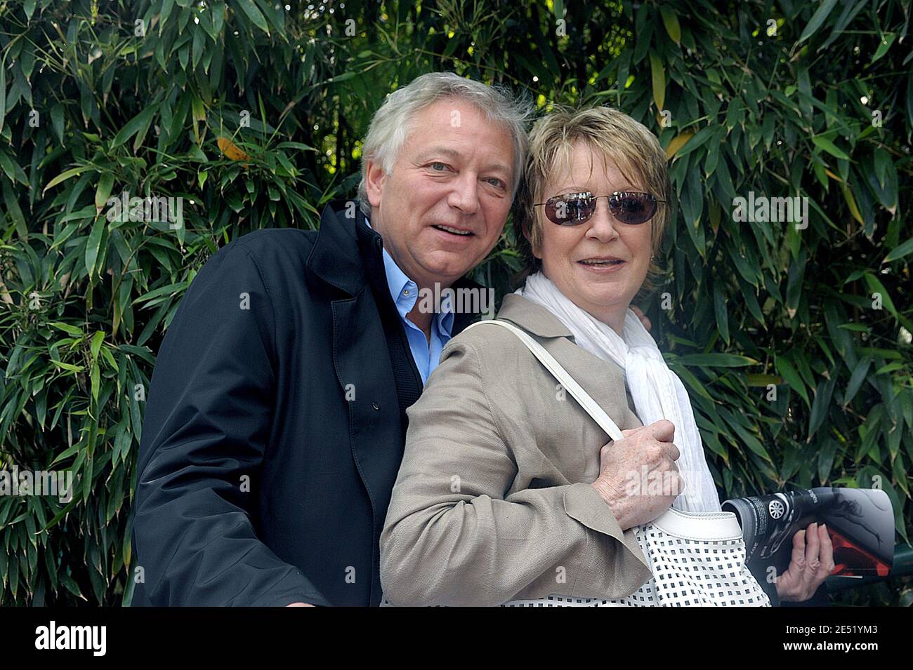 Laurent Boyer and his wife Alice Dona arrive at the VIP area 'Le ...