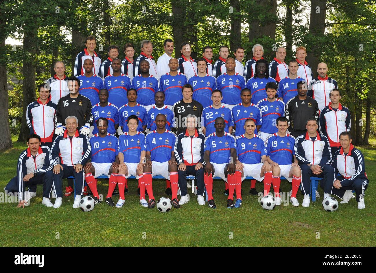 France's national team soccer players who are participating in the Euro 2008 tournament pose for the official photo (First row, L-R, Sidney Govou, Samir Nasri, Patrick Vieira, Raymond Domenech, Lilian Thuram, Karim Benzema and Willy Sagnol. Second row, L-R, Sebastien Frey Lassana Diarra, Patrice Evra Claude Makelele, Gregory Coupet, Franck Ribery, Florent Malouda, Jeremy Toulalan and Steve Mandanda. Third row, L-R, Nicolas Anelka, Eric Abidal, William Gallas, Thierry Henry, Francois Clerc, Jean-Alain Boumsong, Bafetimbi Gomis and Francois Clerc in Clairefontaine, near Paris, France on June 1, Stock Photo