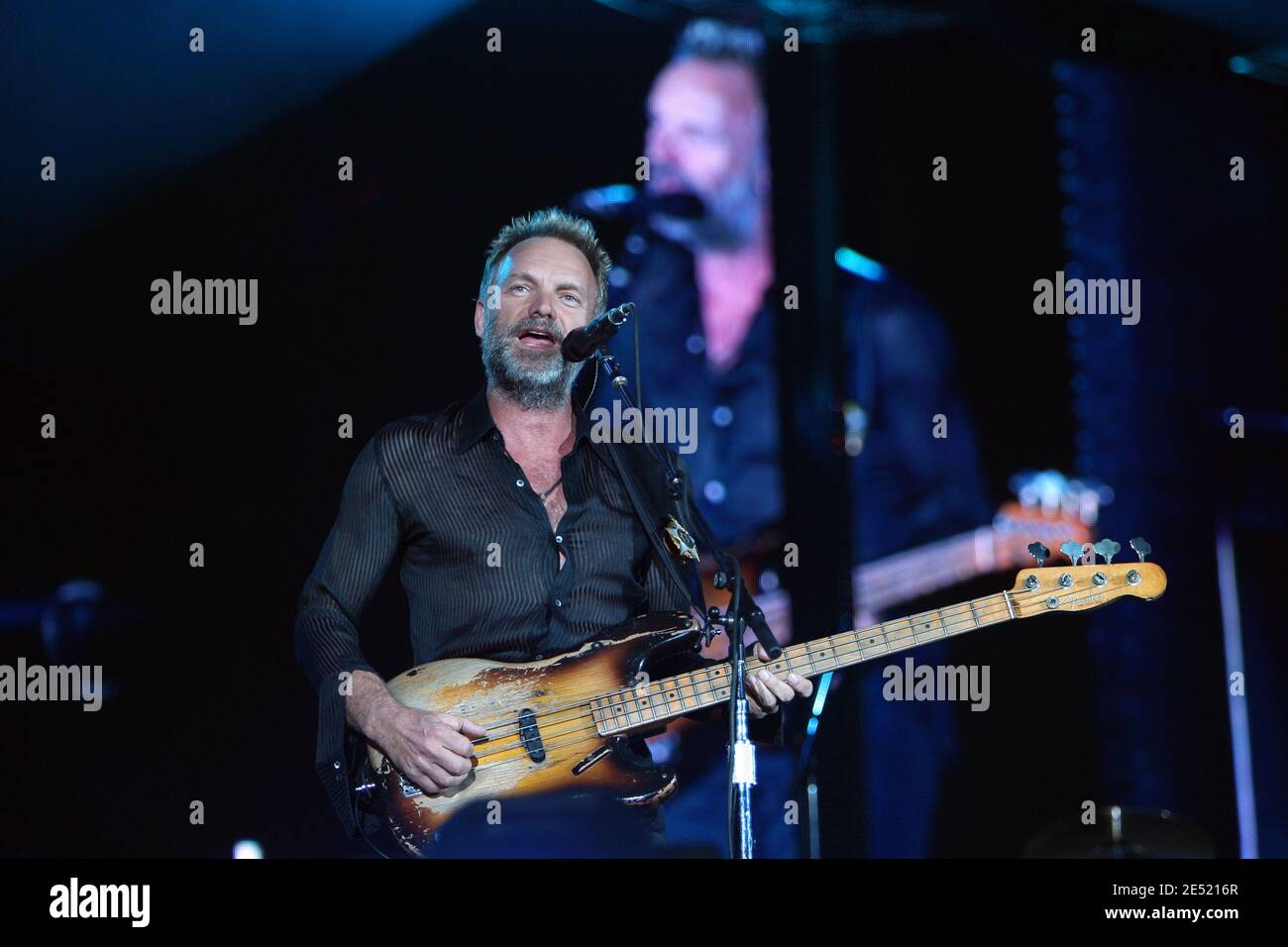 Sting, lead singer and bass guitar of 'The Police' performs live with ...