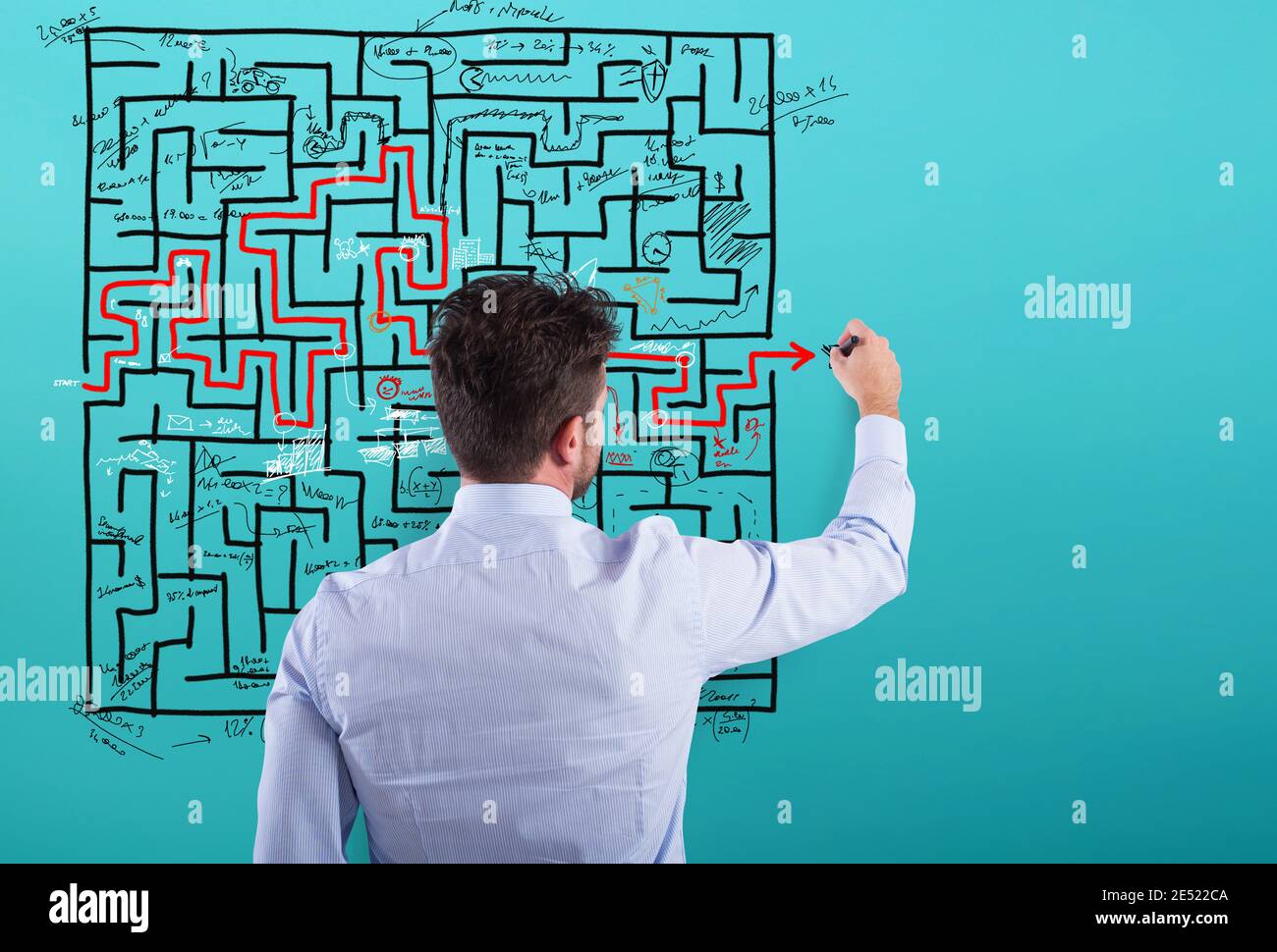 Businessman solve a complex maze with a lot of difficulties Stock Photo
