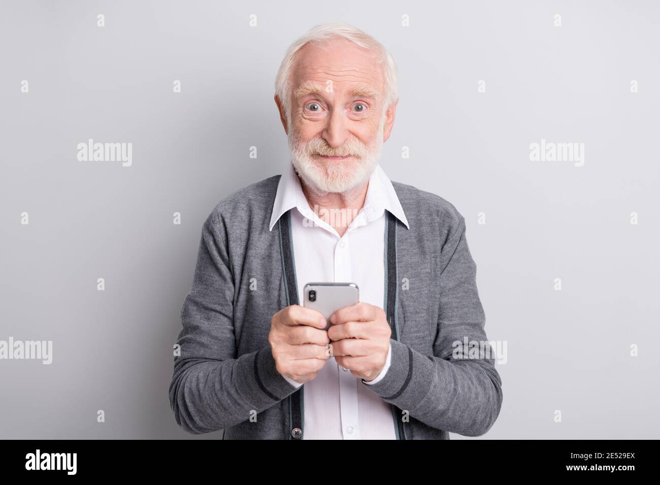 Old man white hair cardigan hi-res stock photography and images - Alamy