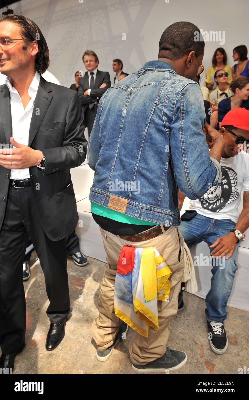 Kanye West and Pharrell Williams vibing front row at Louis Vuitton's SS22  Runway Show Credit: @juliendc #lessiswore