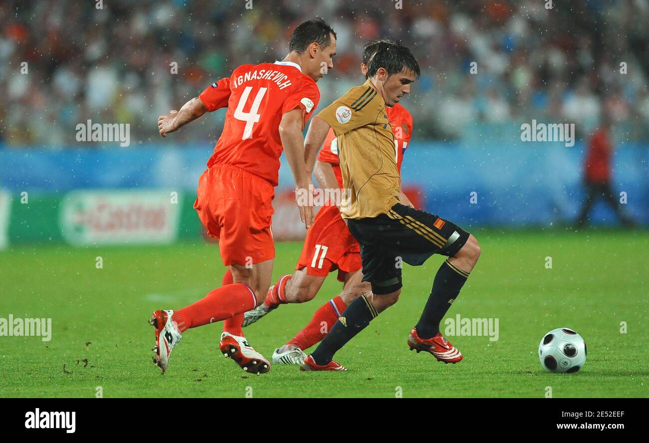 Spain's David Villa (C) battles for the ball with Russia's Sergei Ignashevich (L) and Sergei Semak players during the UEFA European Championship 2008, Semi Final, Russia vs Spain at Hersnt-Happel Stadium in Vienna, Austria on June 26, 2008. Spain won 3-0. Photo by Steeve McMay/Cameleon/ABACAPRESS.COM Stock Photo