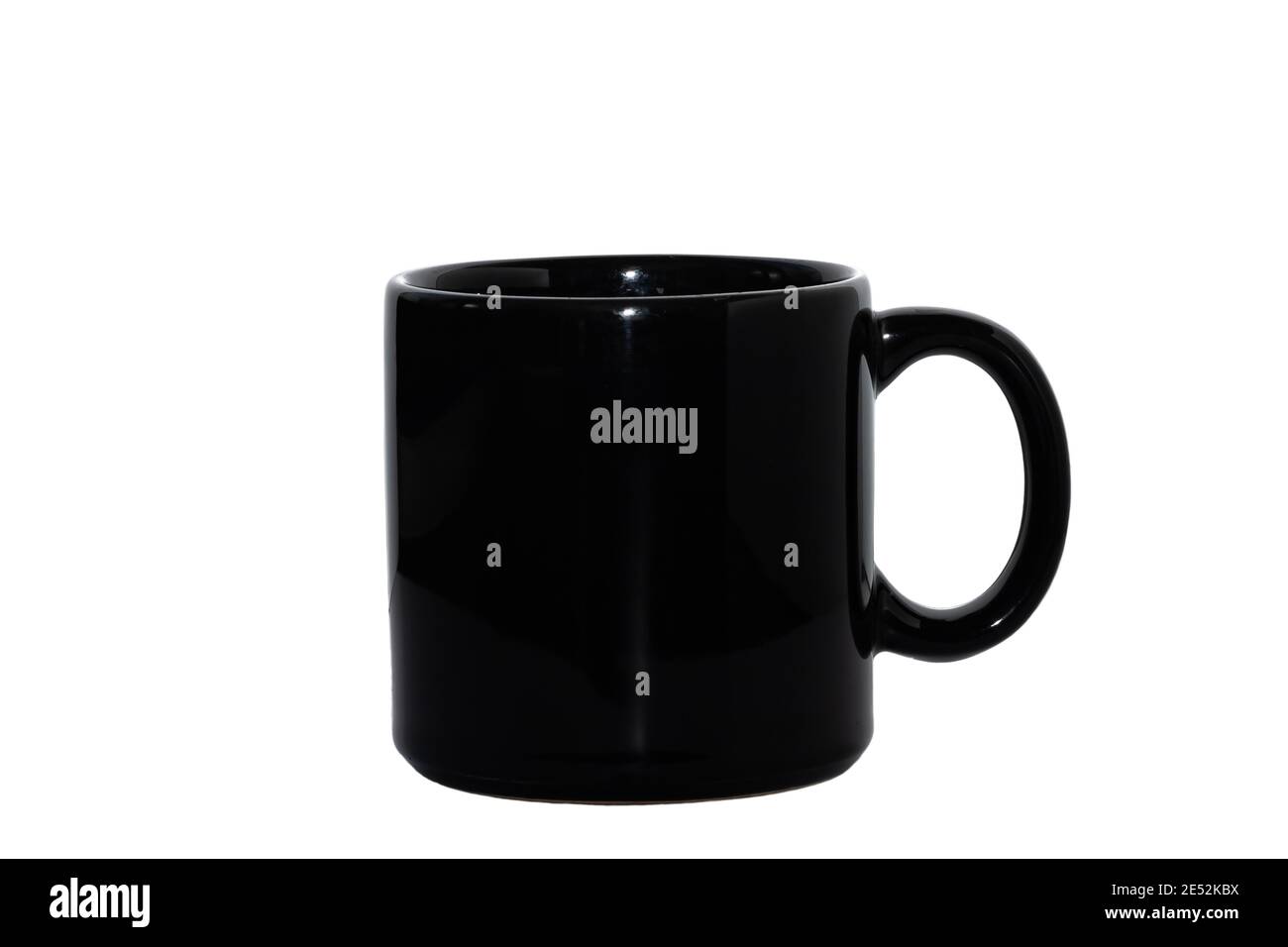 Black ceramic mug isolated on white background. Copy space for your design Stock Photo