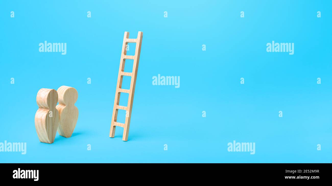 People stand near a ladder to nowhere. Career ladder. Open possibilities concept. Opportunity for growth and development. A deceiving way. Not the bes Stock Photo