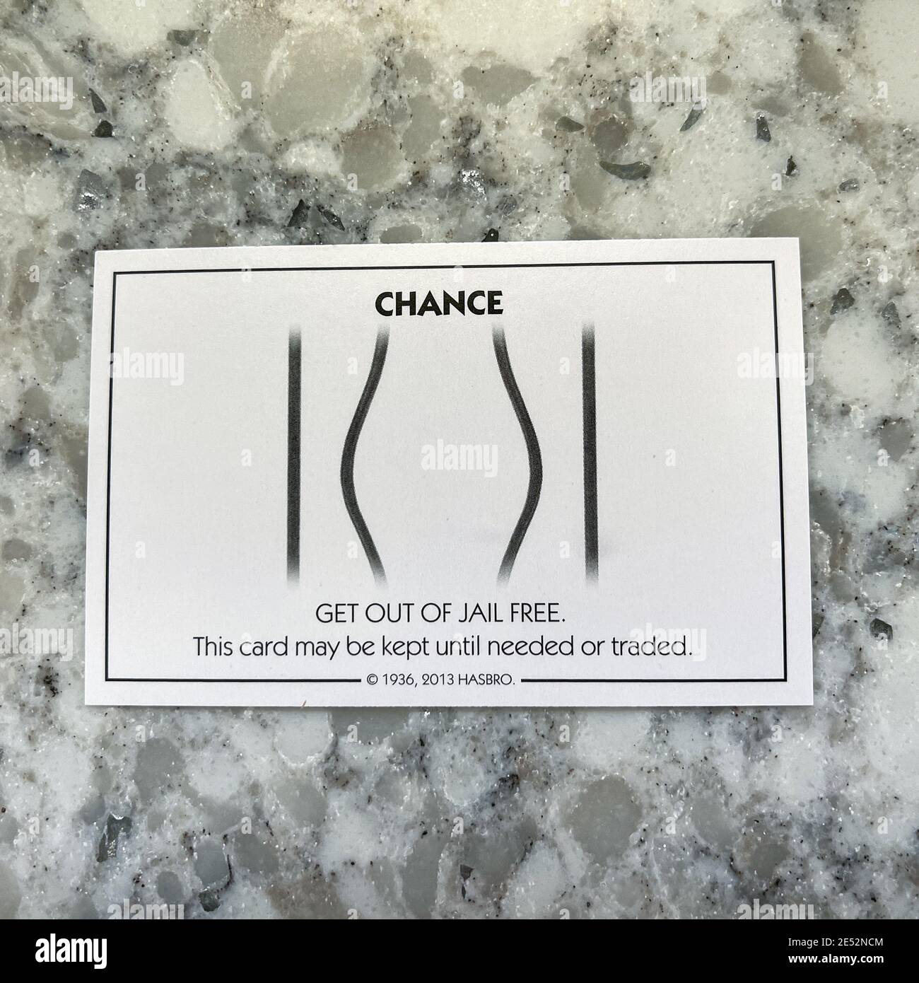 Orlando,FL USA - January 25, 2021:  A get out of Jail Free card from a monopoly set.  Concept pardon, presidential, business, banking and finance. Stock Photo