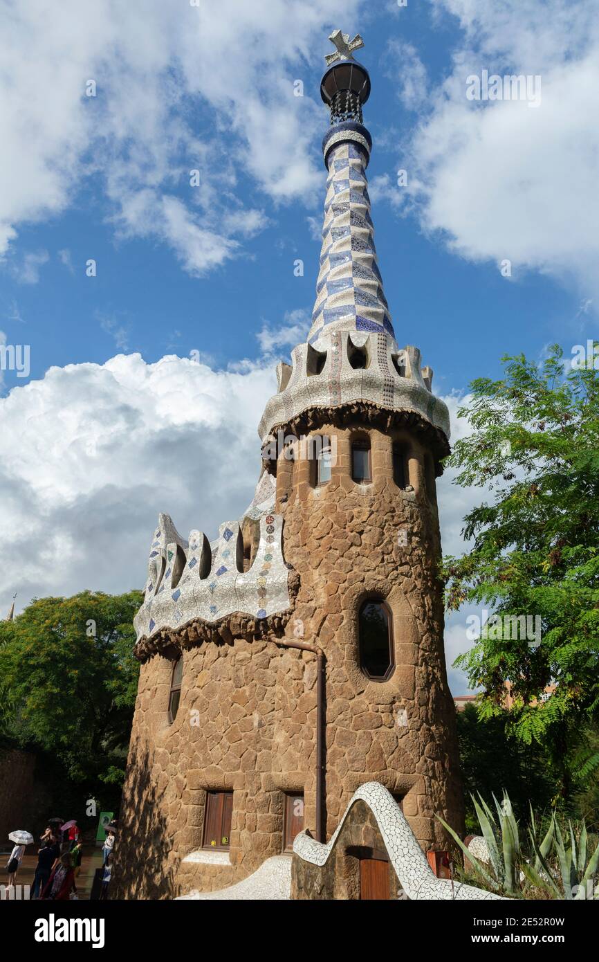 Entrance tower with spire in Park Guell designed by Antoni Gaudi Stock