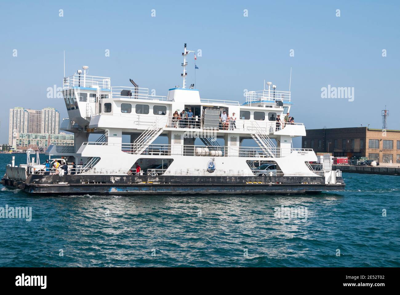 The worlds shortest ferry ride at 120m (400 feet)  loaded with cars and passengers for the quick trip to the Toronto's Island airport. Stock Photo