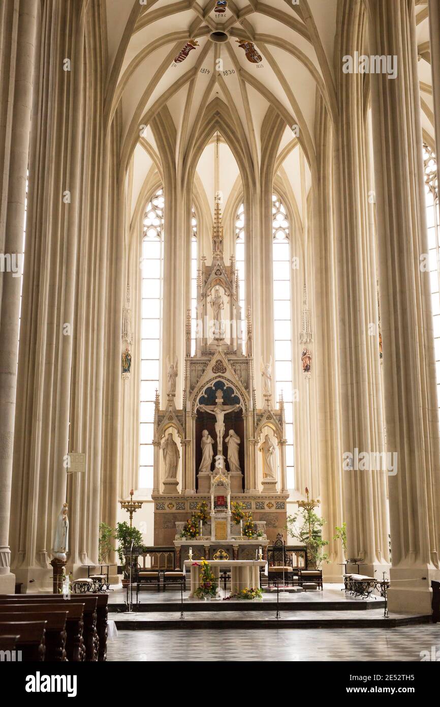 The interior and altar of the Church of St James, a late Gothic Catholic church in Brno, Czechia. Stock Photo