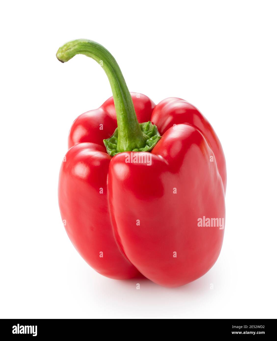 Red bell peppers on a white background Stock Photo - Alamy