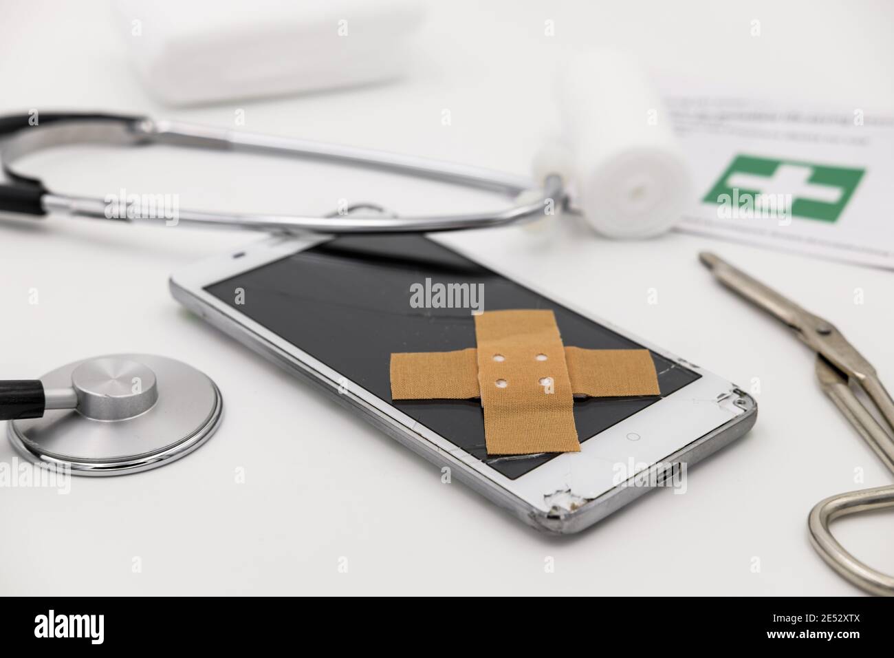 stethoscope on mobile. healthcare concept. Broken HP Stock Photo Alamy