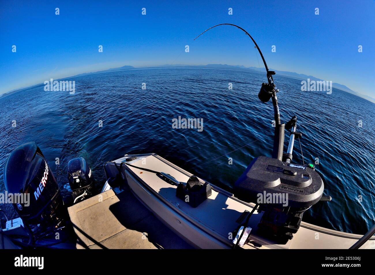 Salmon angling on the west coast of Vancouver Island using downriggers and a rod and reel Stock Photo