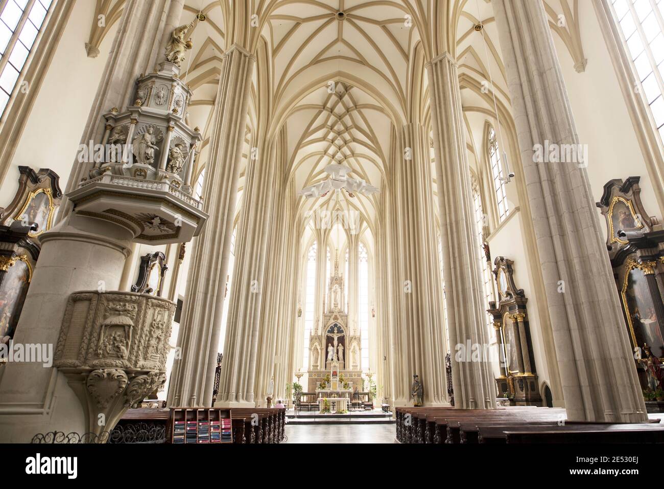 The interior and altar of the Church of St James, a late Gothic Catholic church in Brno, Czechia. Stock Photo