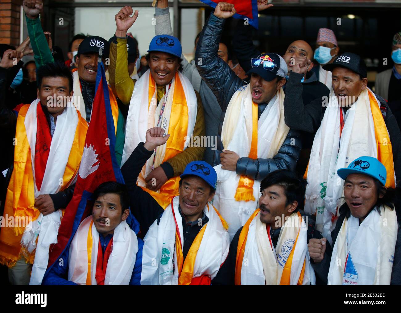 Kathmandu, Nepal. 26th Jan, 2021. Nepalese climber Nirmal Purja, who along with his team recently made history by scaling the K2 summit in the winter season, poses for a photograph upon their arrival to Tribhuvan International Airport in Kathmandu, Nepal on Tuesday, January 26, 2021. Credit: Skanda Gautam/ZUMA Wire/Alamy Live News Stock Photo