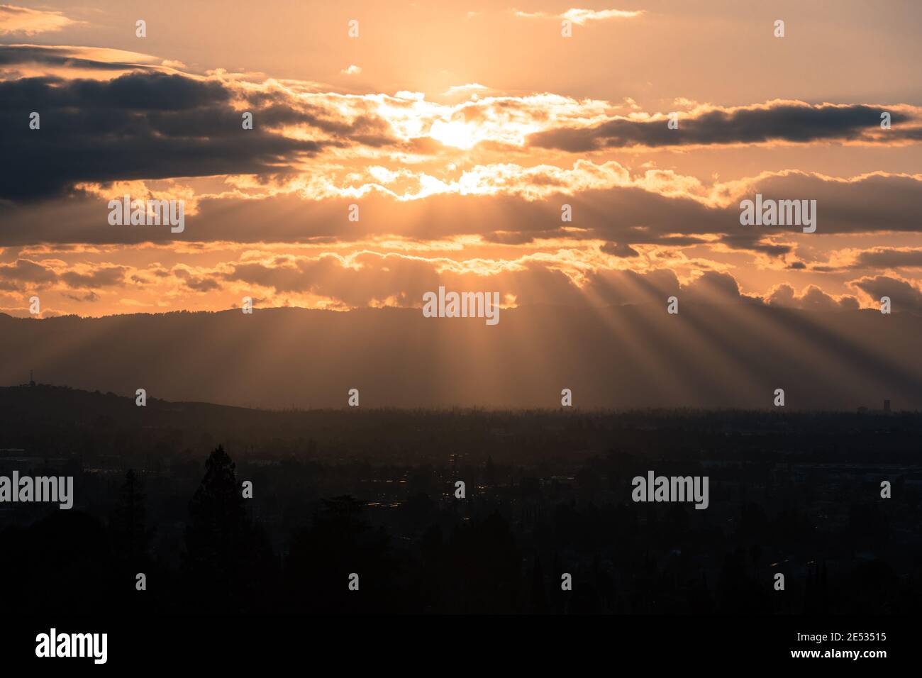 Sun Rays over San Jose in Stormy Skies Stock Photo