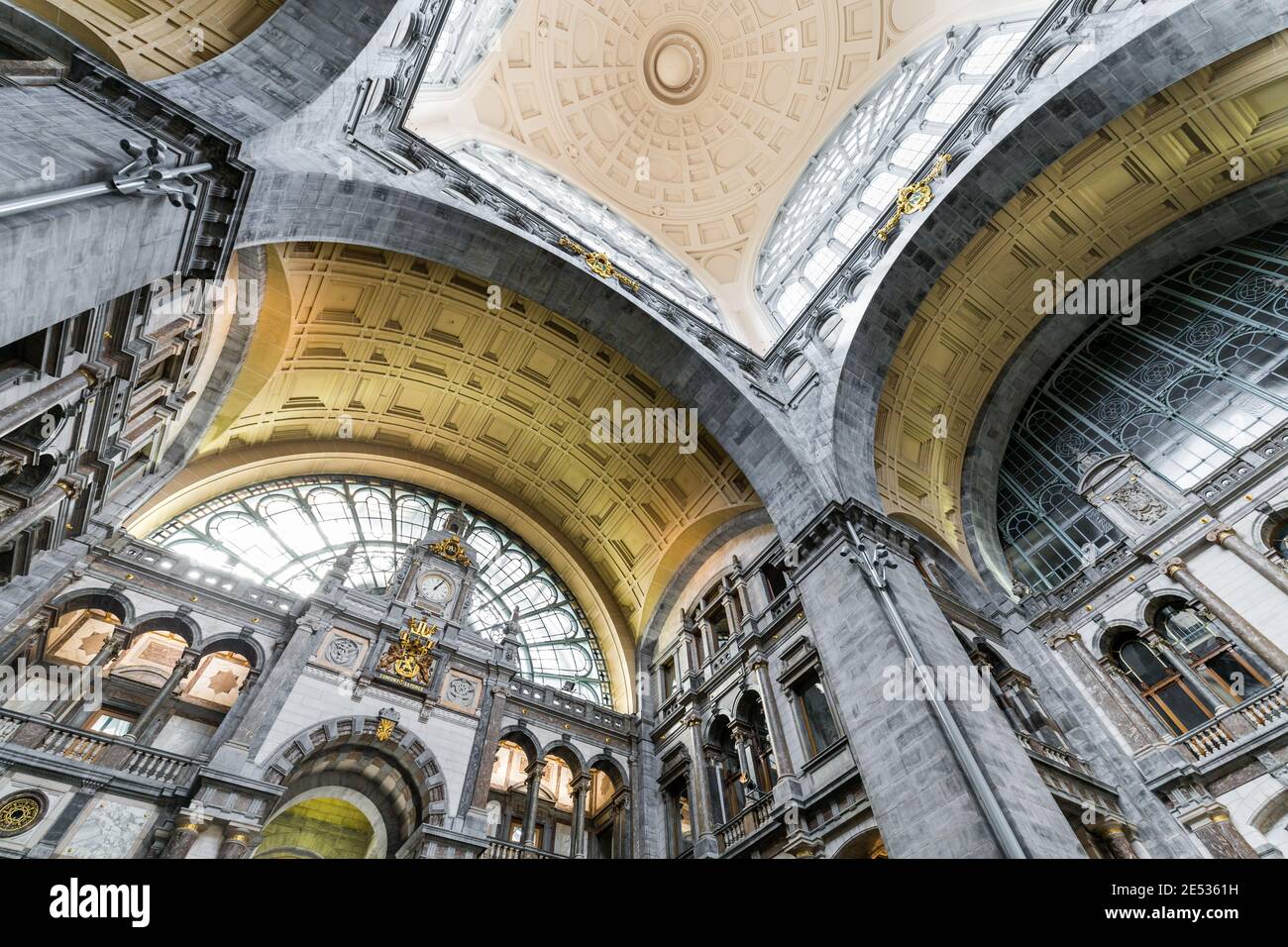 Wide angle shot of the vault of an eclectic and richly adorned trainstation Stock Photo