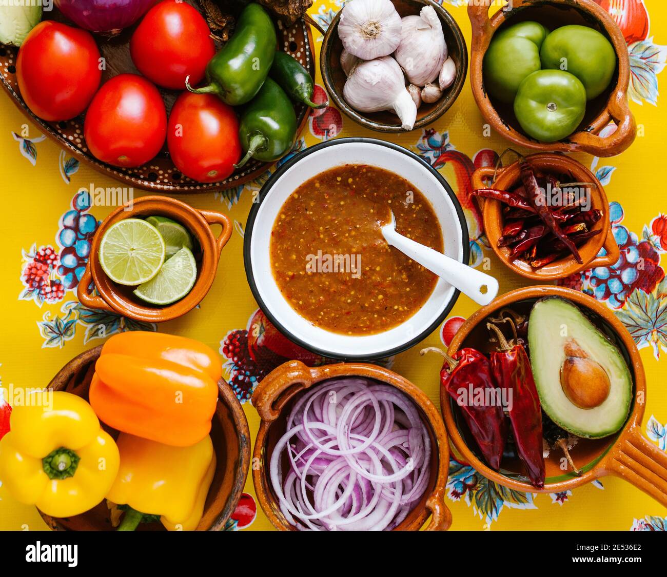 mexican salsa spicy sauce and ingredients on a table kitchen in Mexico