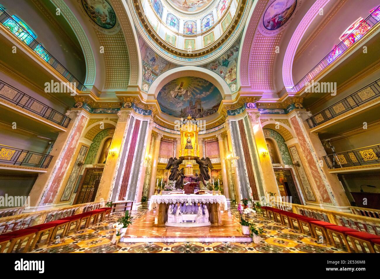 Symmetrical wide angle view of the apse of a colorful baroque Sicilian cathedral Stock Photo