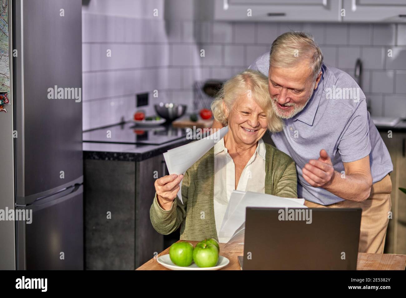 Senior woman managing finances hi-res stock photography and images - Alamy