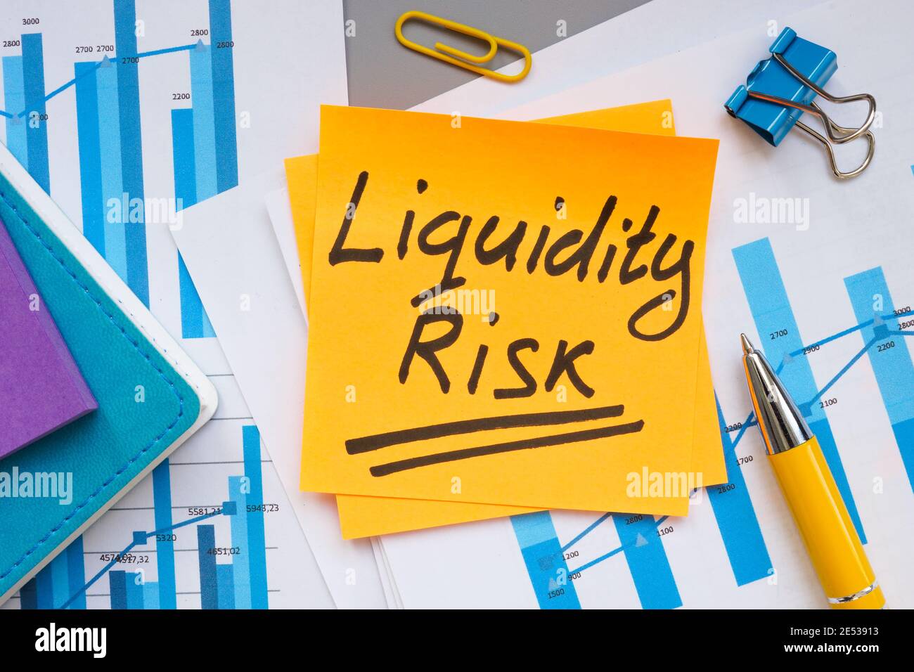 Liquidity risk phrase on the financial charts. Stock Photo