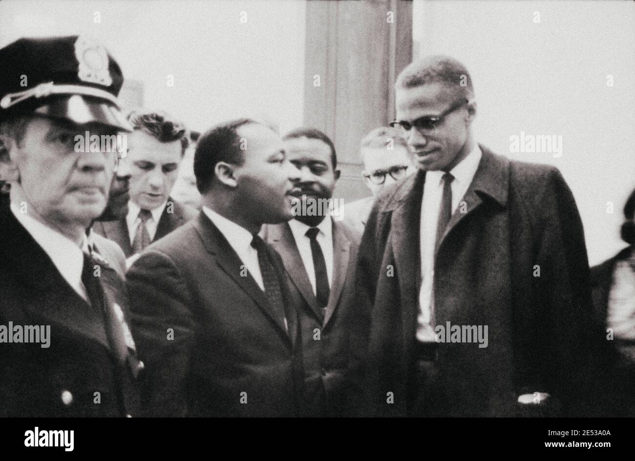 Archival photo of Martin Luther King and Malcolm X waiting for press conference. USA. March 26, 1964 Stock Photo