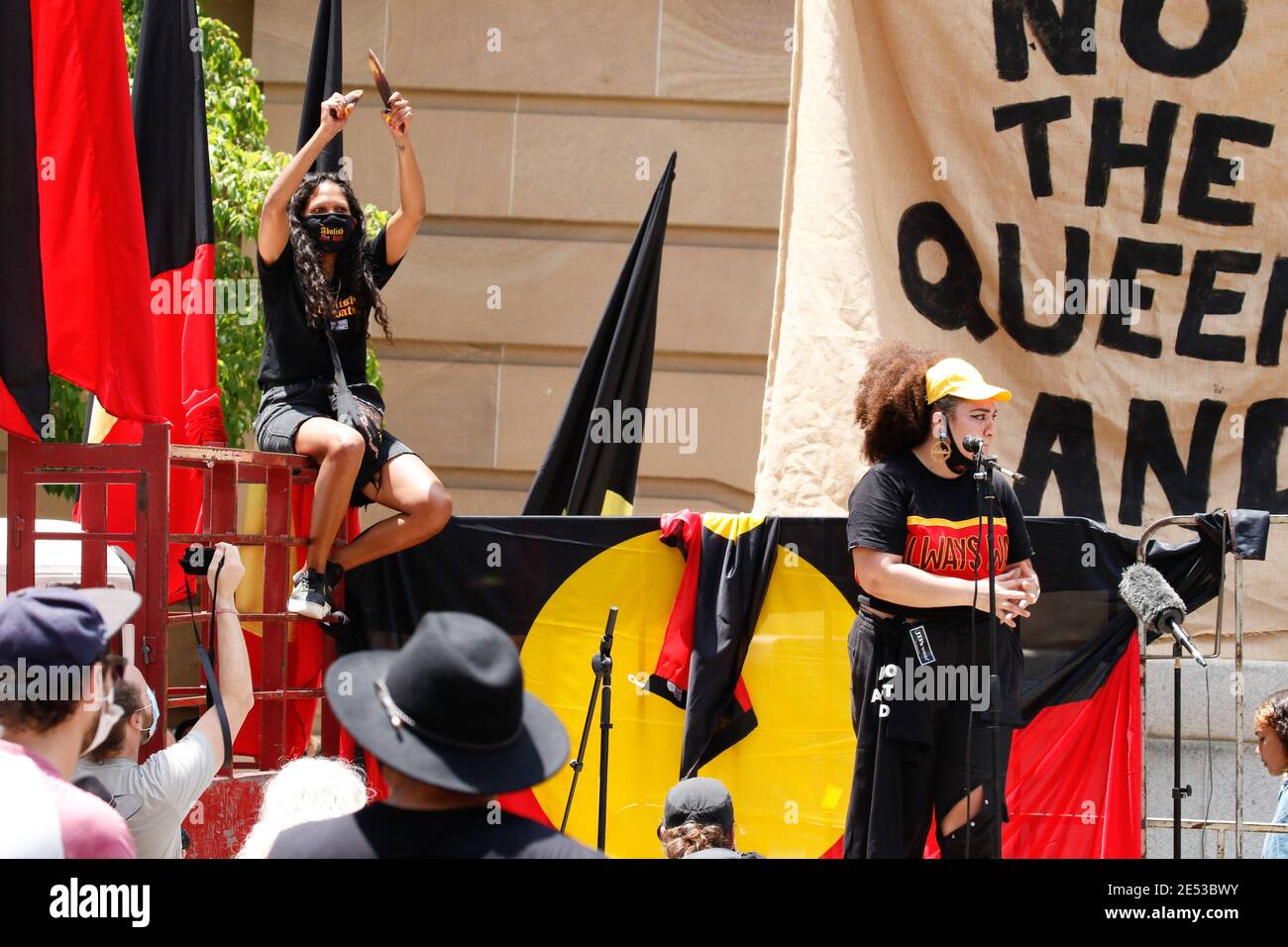 Aboriginal protester recites a poem to the protesters at Queens Crowds of people gathered in Brisbane, Queensland to protest against Australia public holiday, which is a date synonymous with the