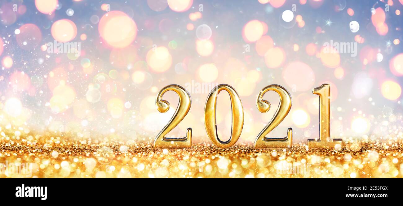 Abstract Card - Happy New Years 2021 - Shiny Numbers With Golden Glitter Stock Photo