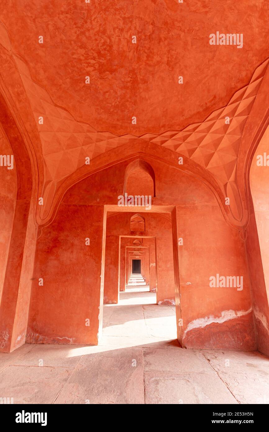 Hallway painted in orange/red color; India Stock Photo - Alamy