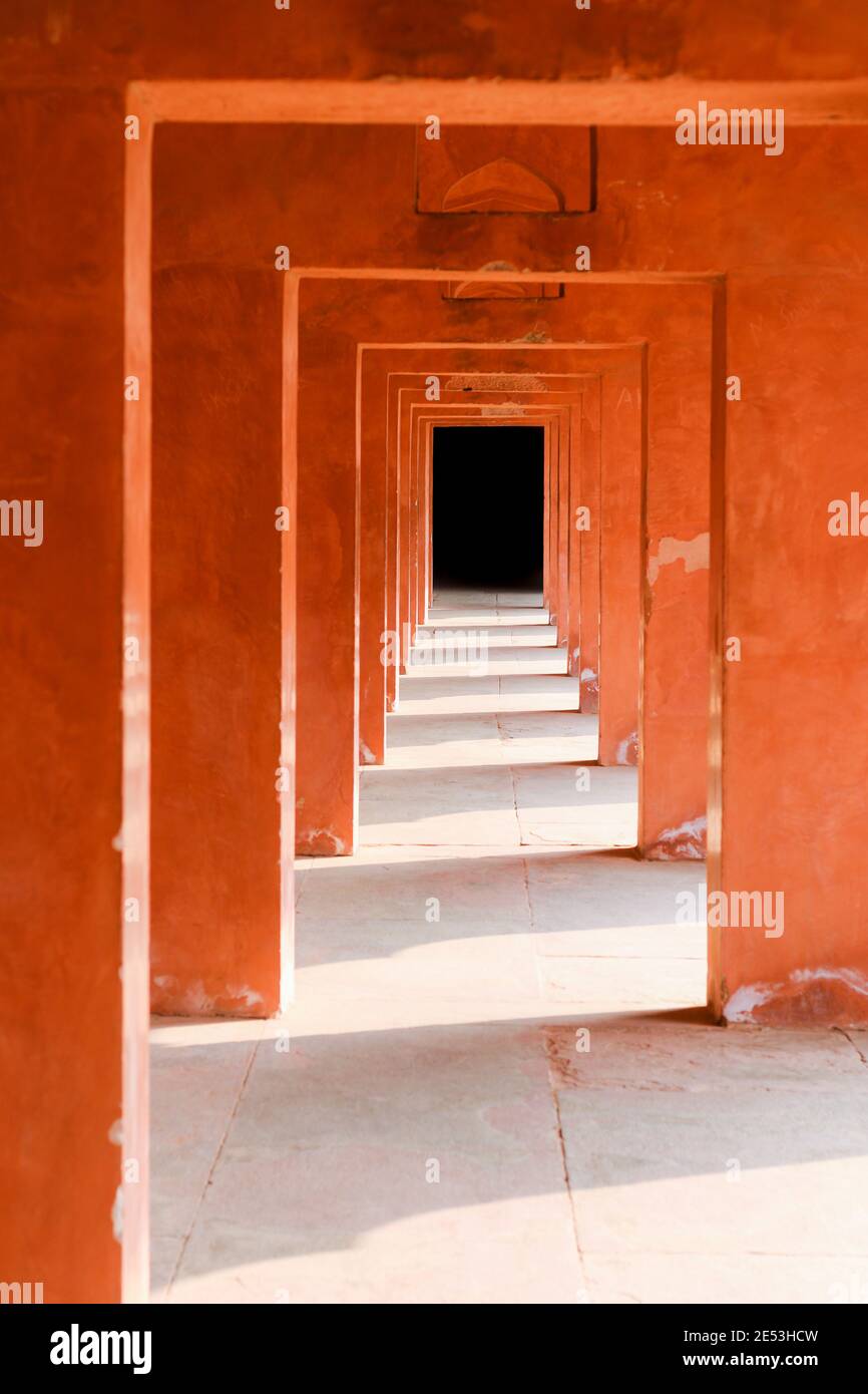 Hallway painted in orange/red color; India Stock Photo - Alamy