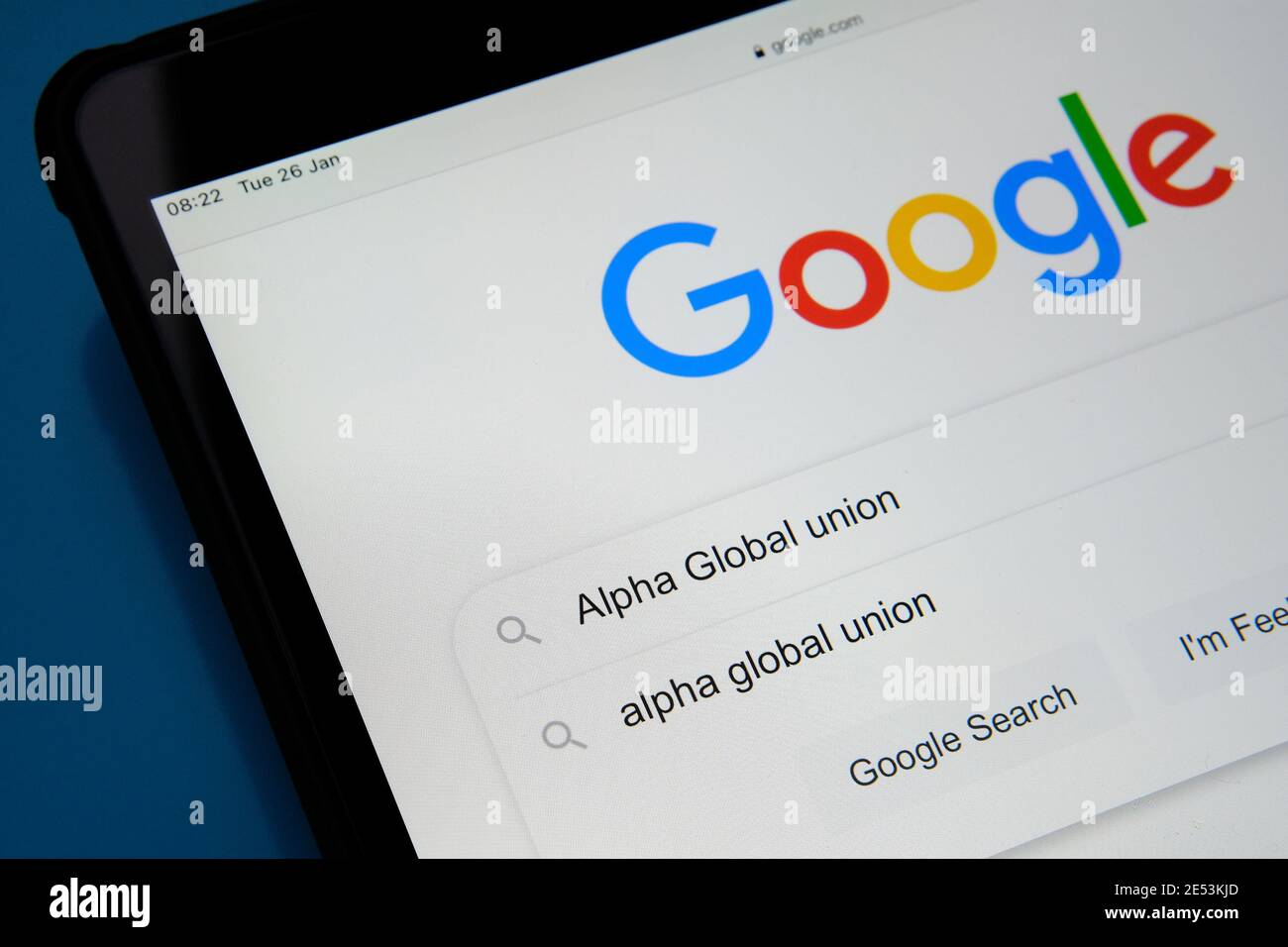 Alpha Global Union words seen typed in Google search bar on the tablet screen. Alphabet workers are announcing Alpha Global, a new global union allian Stock Photo