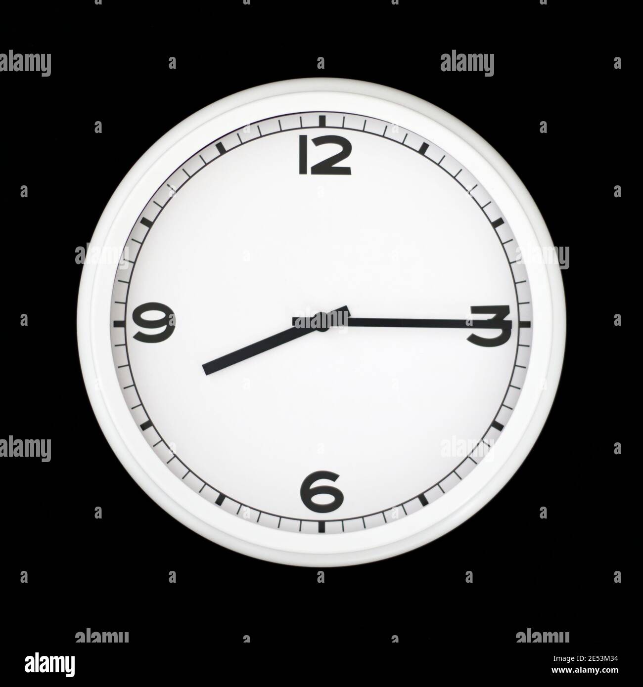 White Round Analog Wall Clock Isolated On Black Background Its Quarter 