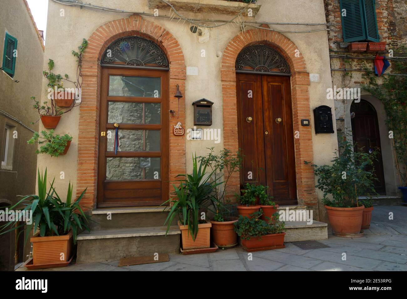 Antique doors. Street of an Italian city. Italy, Tuscany, Grosseto,  Manciano. Stock Photo