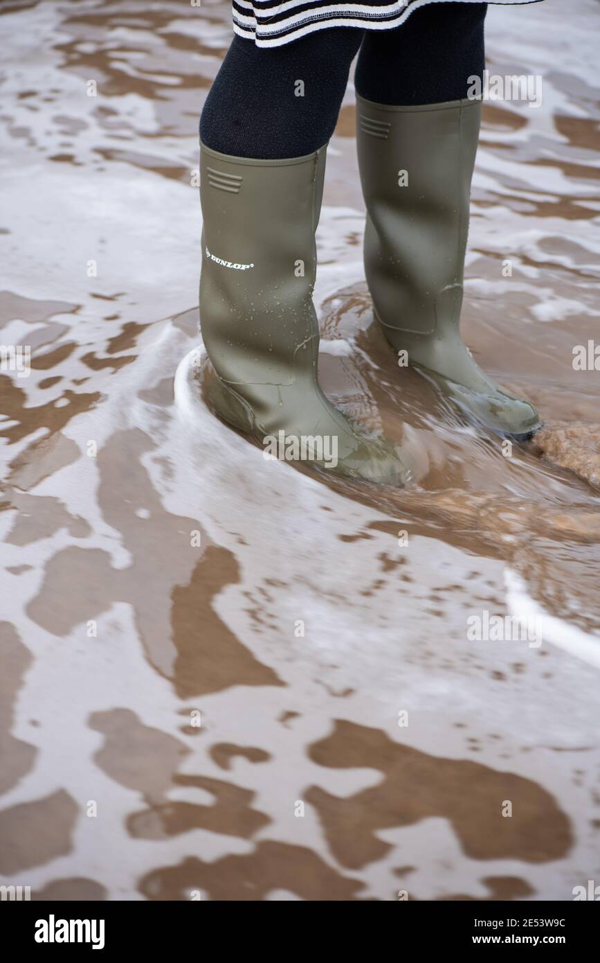 Welly Sea Wellies UK Wading Women Stock Photo