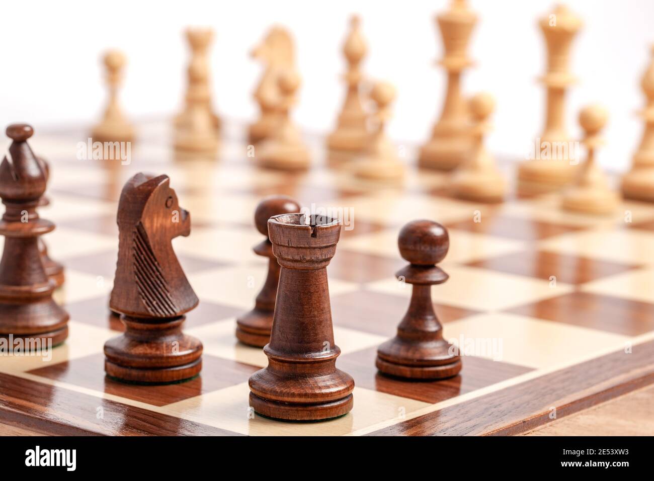 Wooden chess board with chess pieces. Wiew from the corner Stock Photo