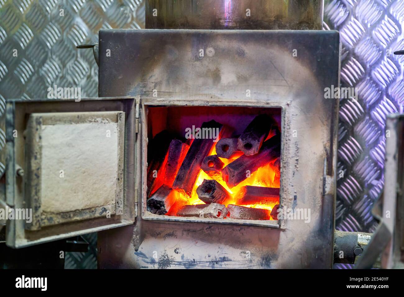 Burning charcoal fire and carbon stove Stock Photo Alamy