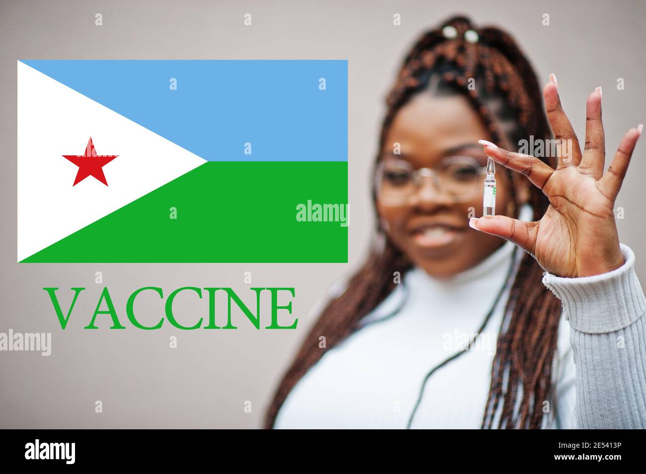 African woman show vaccine for Republic of Djibouti. Vaccination of Africa countries concept. Stock Photo