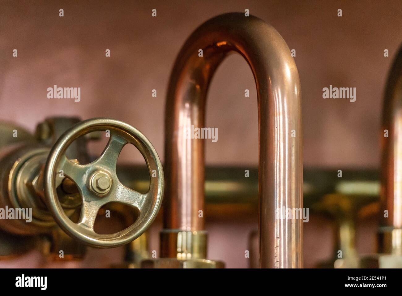 Copper pipe and valve. Part of the device at the beer factory. Beer Tap ...